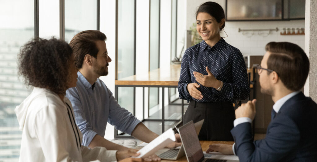 Workers Discussing in a Workplace
